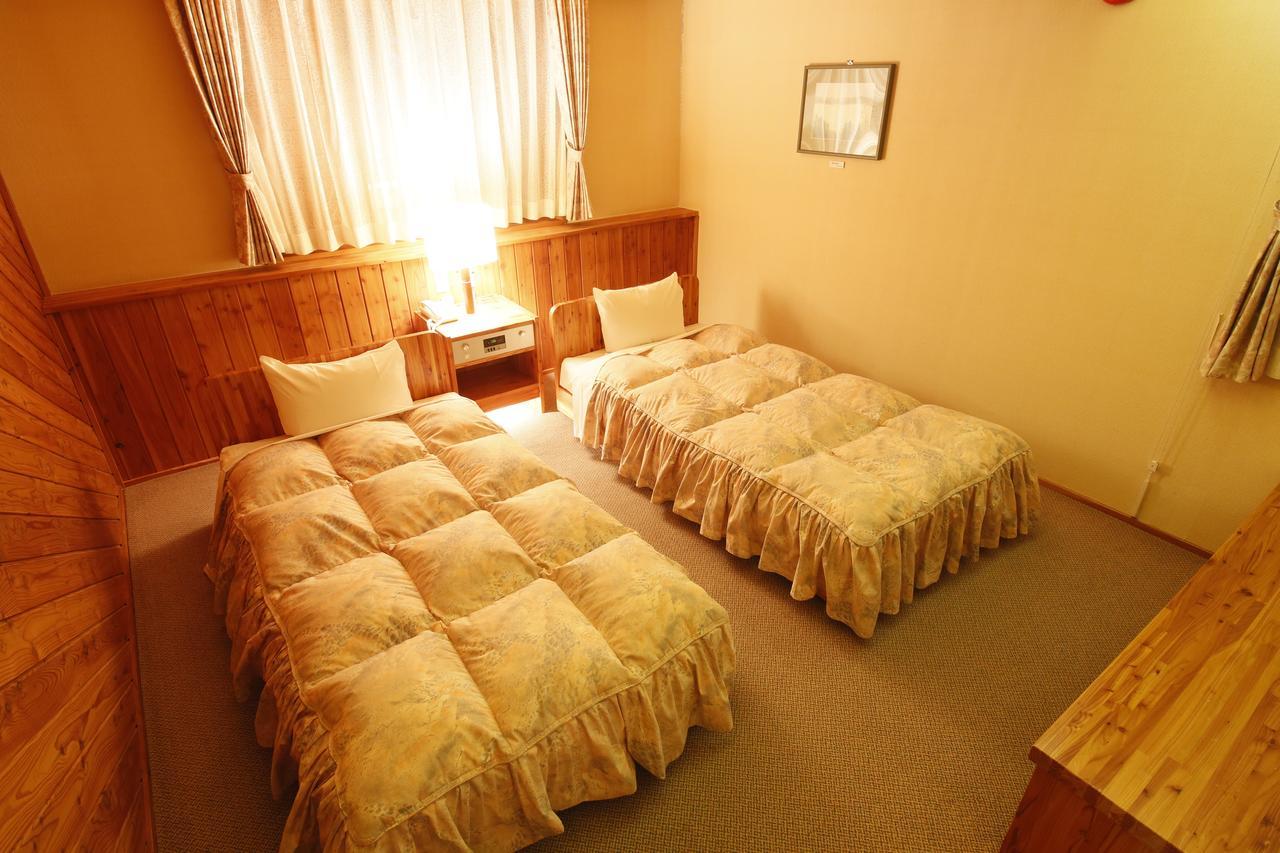 Log Hotel Larch Lake Kanayama Minamifurano Номер фото