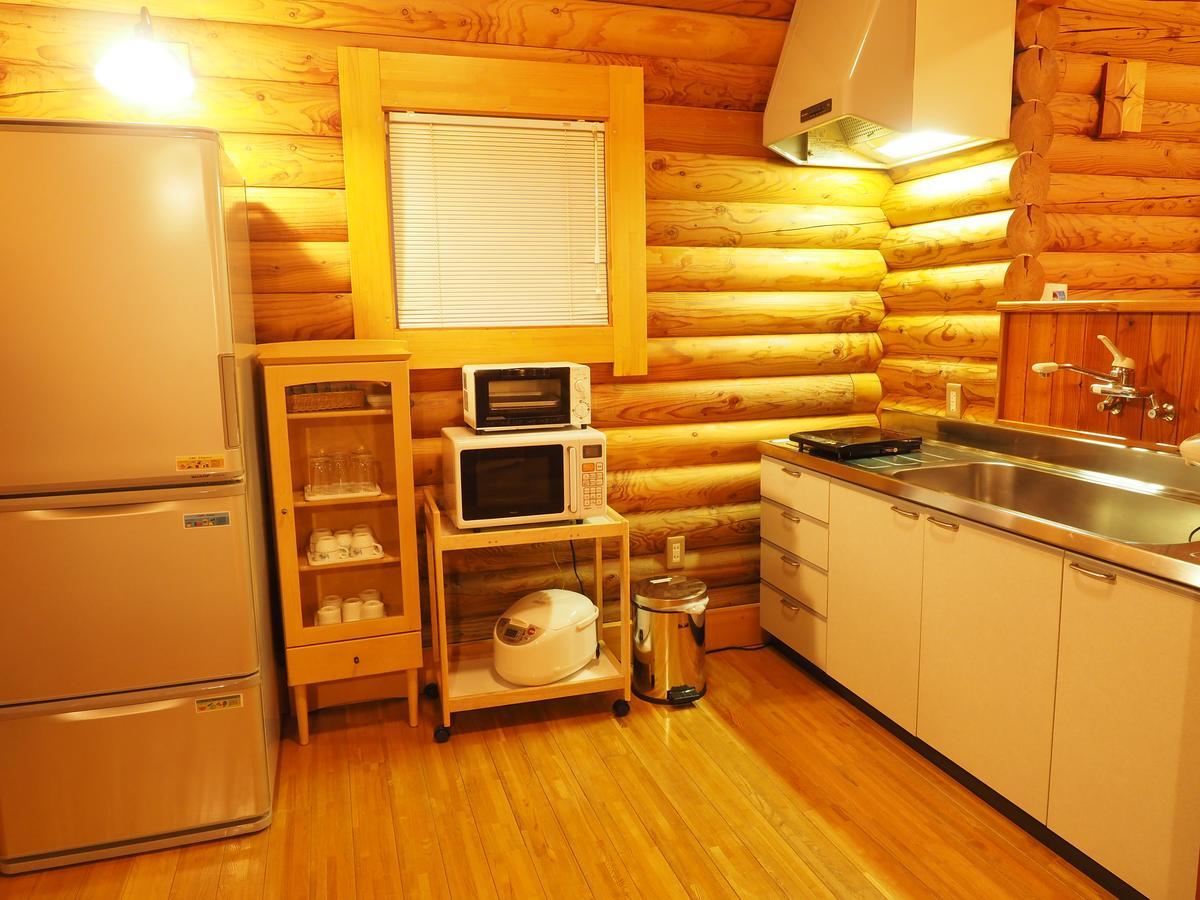Log Hotel Larch Lake Kanayama Minamifurano Номер фото